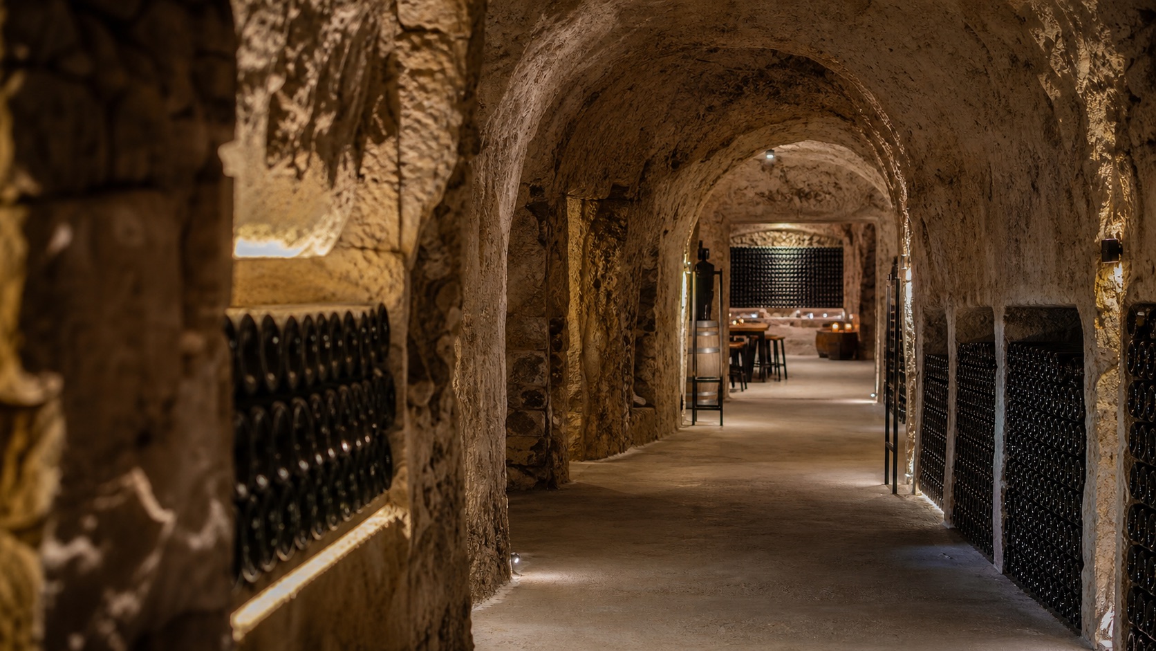 Historic chalk cellar corridor for a Champagne house visit in Reims